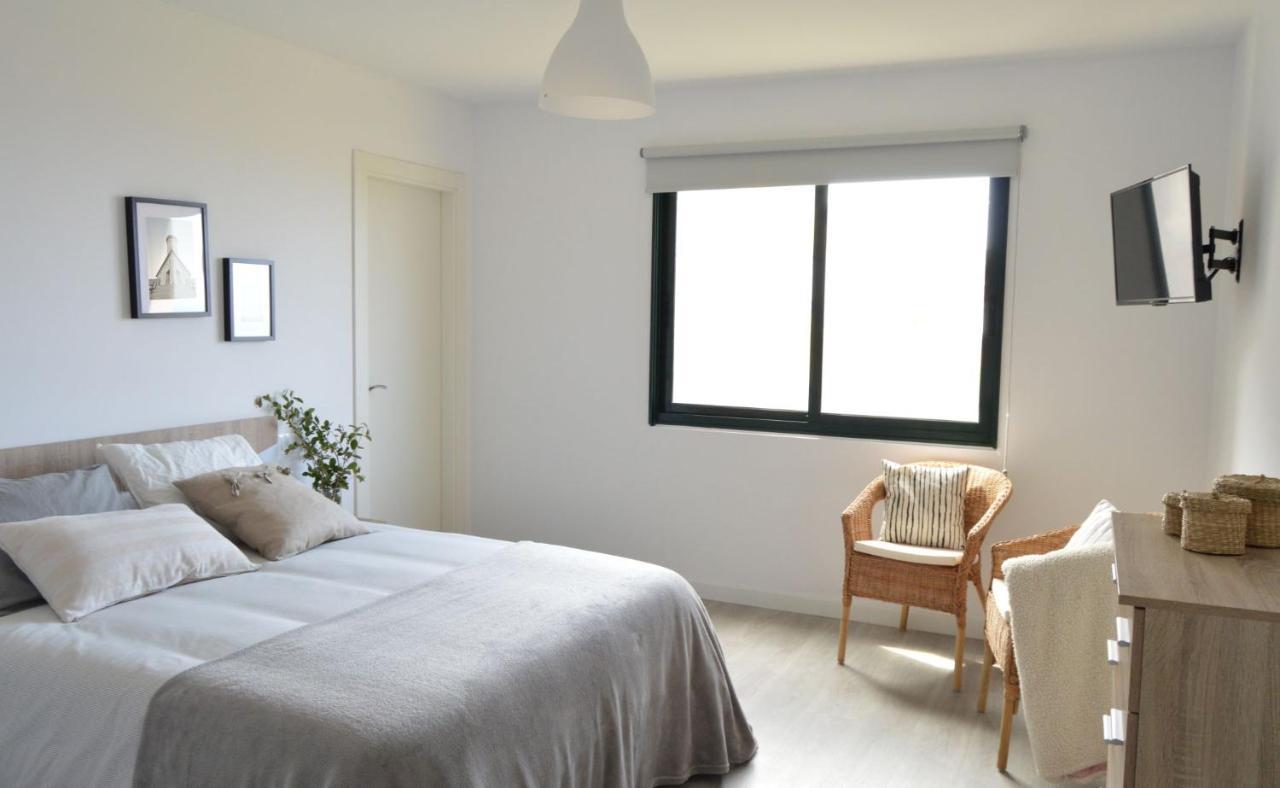 Os Faros Pisos Turisticos Apartment Arou Exterior photo